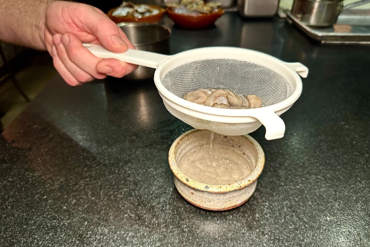 Straining the oysters