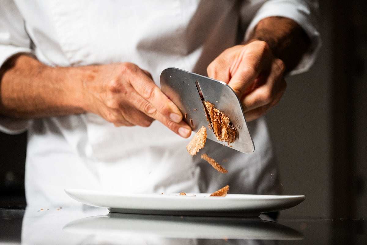 Tartufo Regale being shaved.