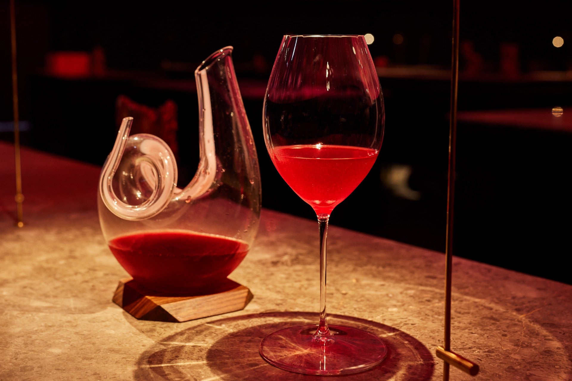 A red drink on a table.