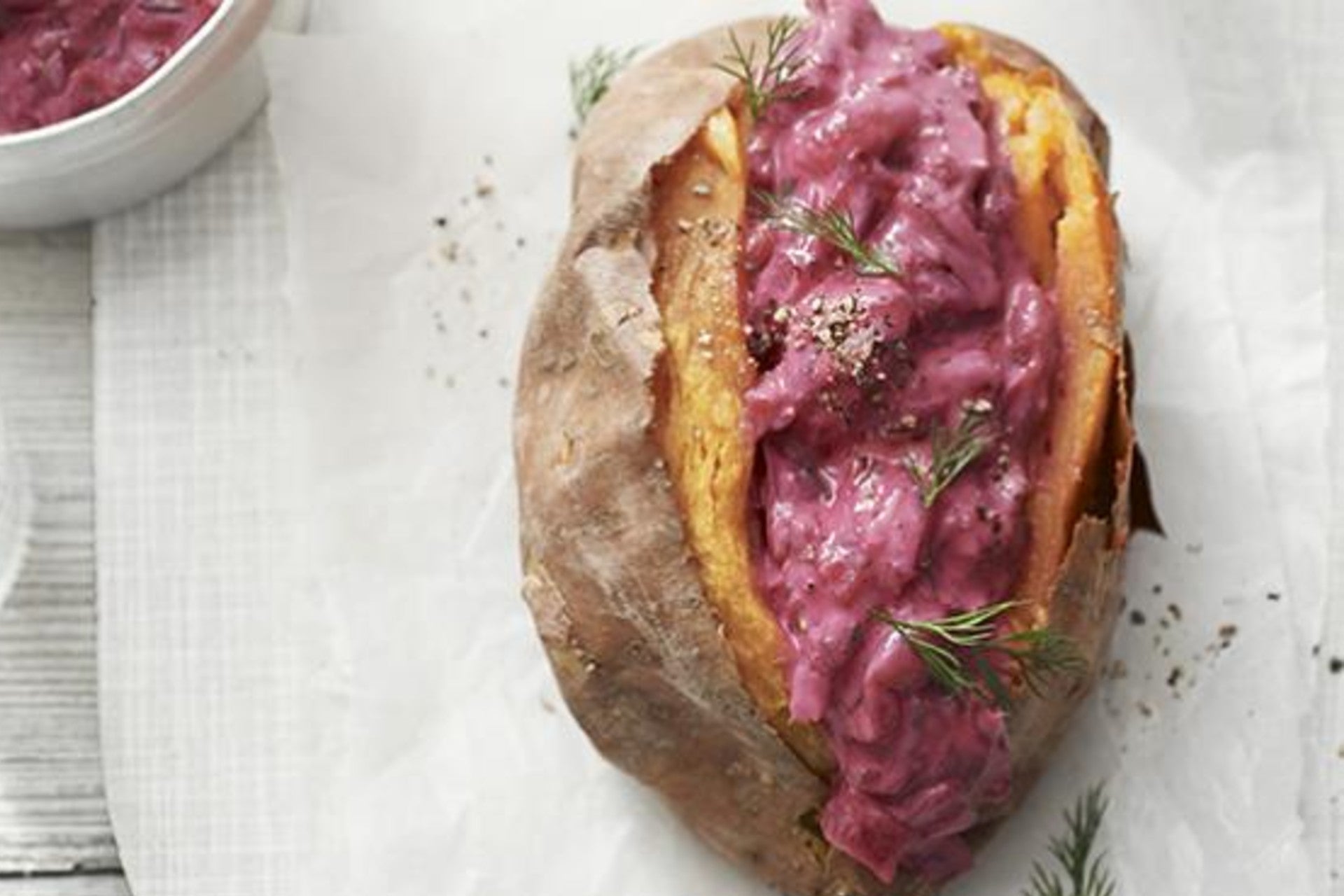 baked potato with beetroot cream