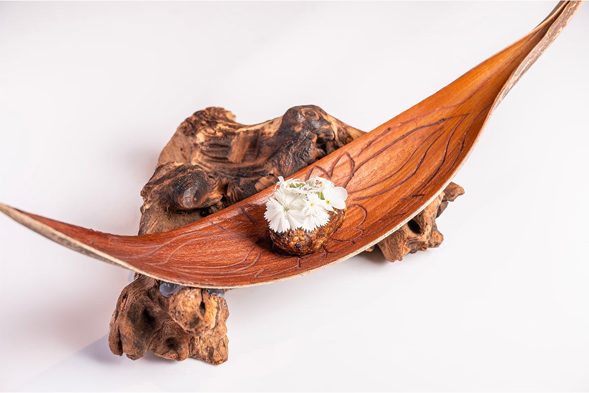 Confit duck, ash-roasted artichokes, black lime chutney at Tresind Studio.