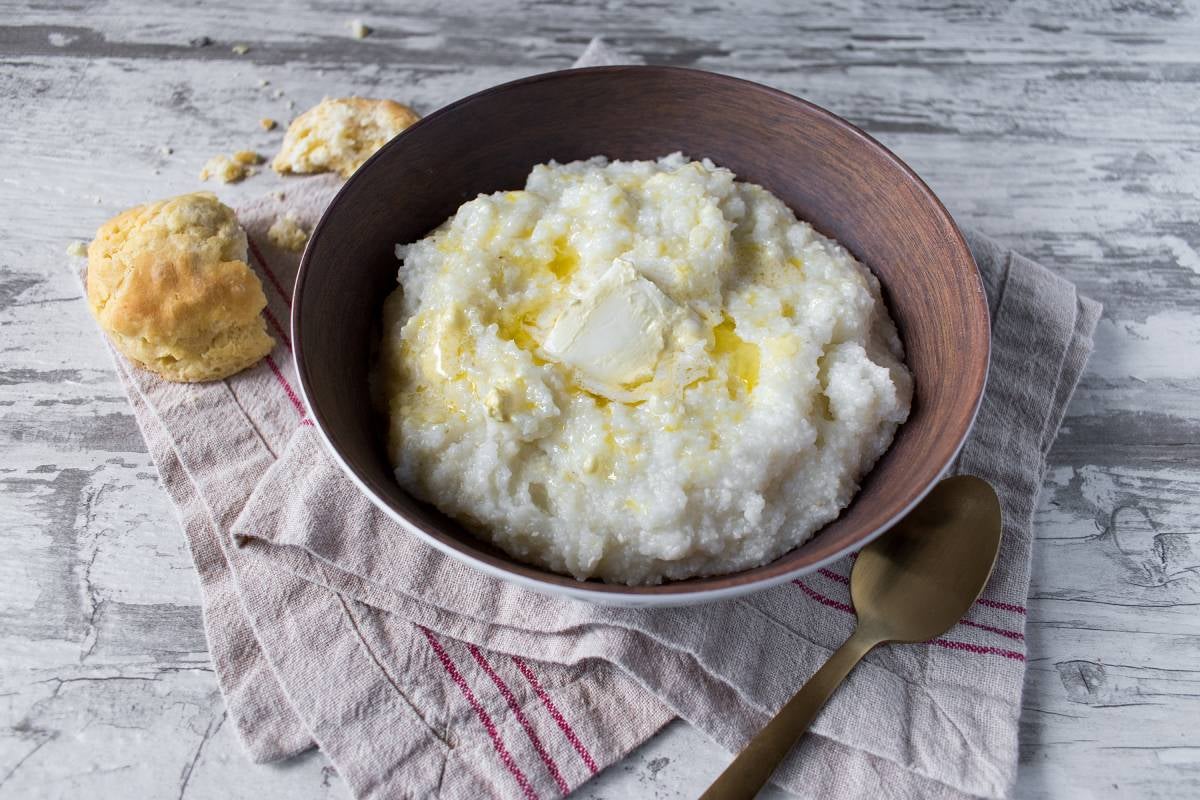 Bowl of grits made from dried corn kernels and cooked with water