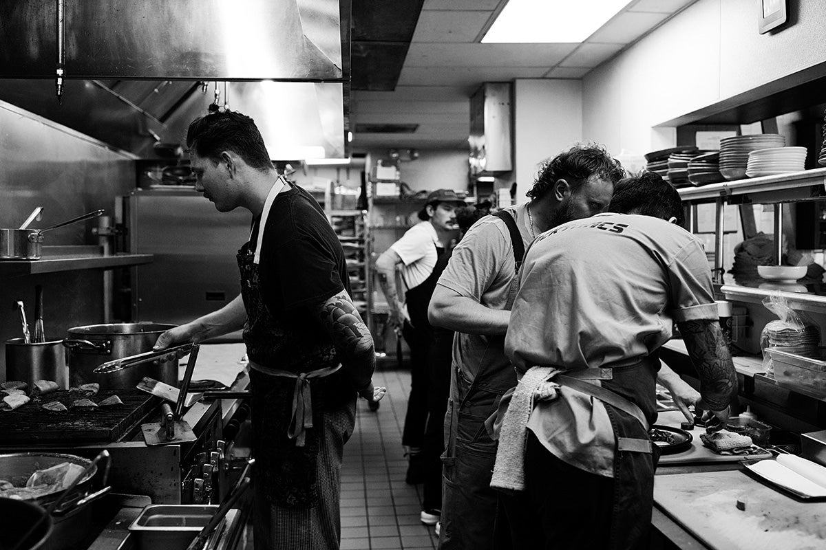 Chefs in the kitchen at Friends with benefits.