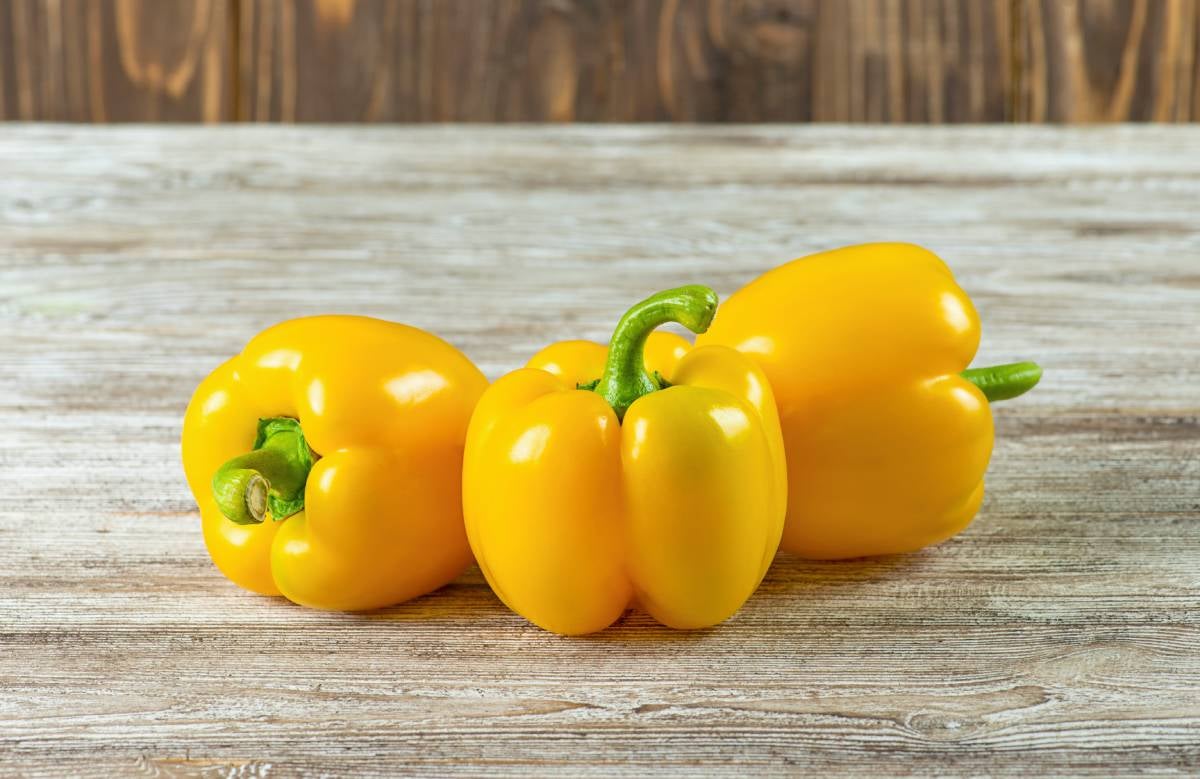 Three yellow bell peppers to add to your diet