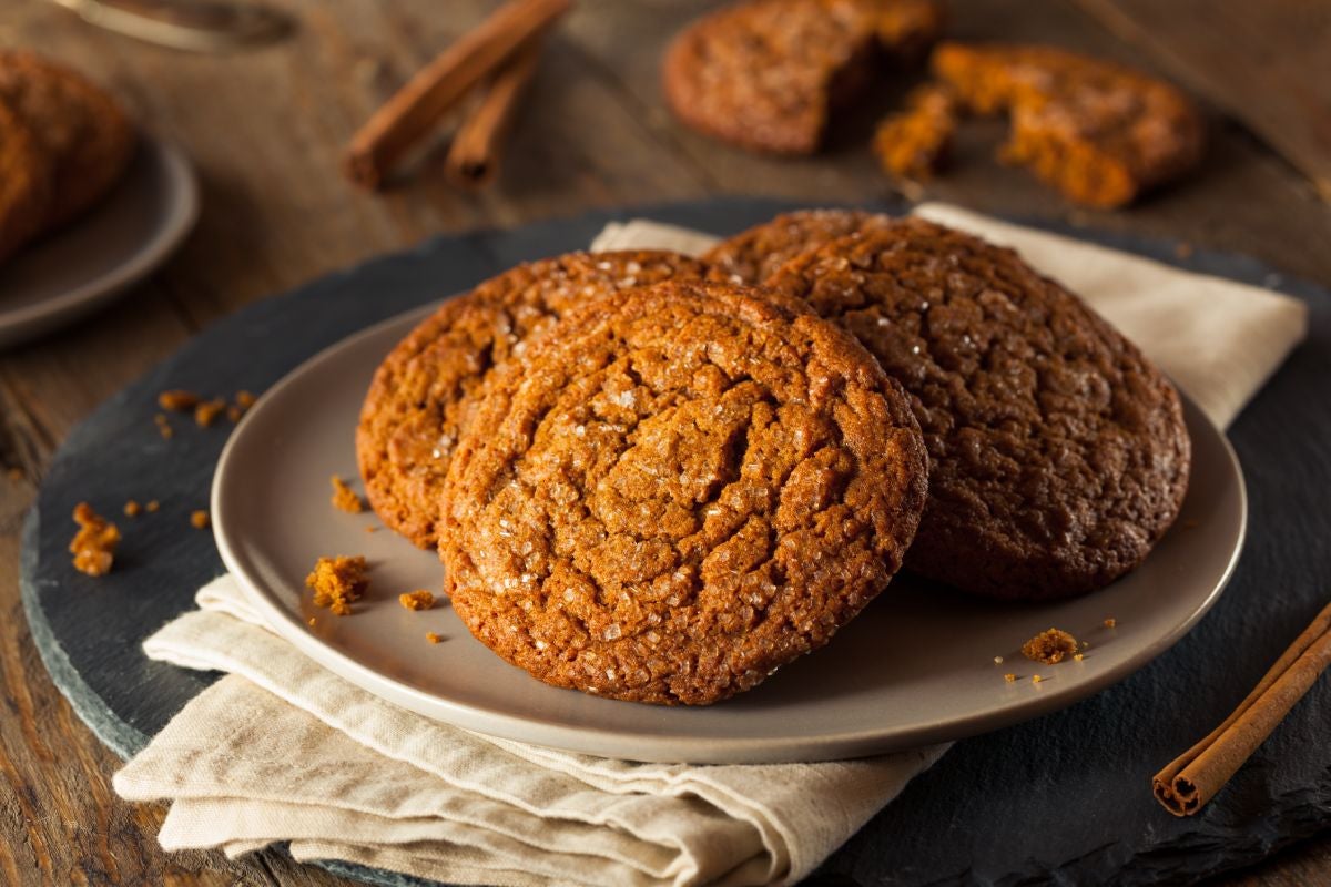 A plate with spicy  and aromatic gingersnaps cookies