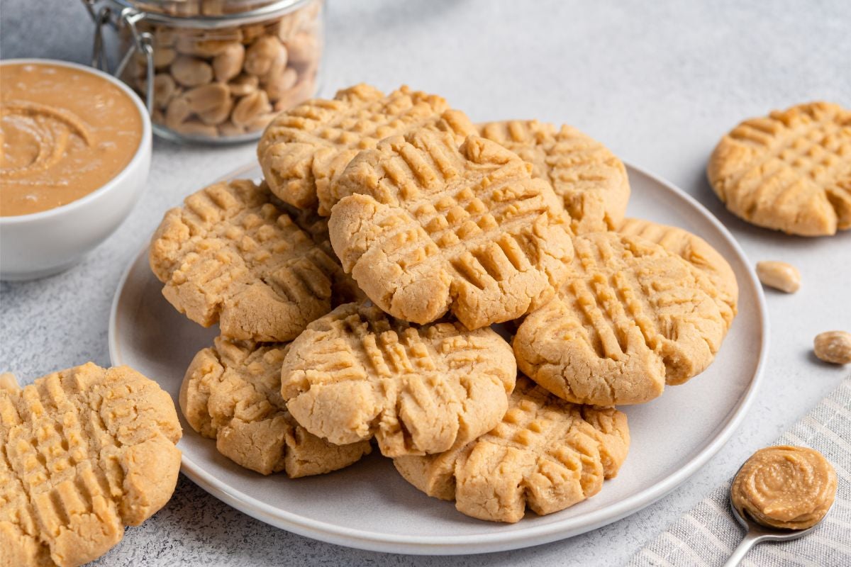 A plate with some home made soft and chewy Peanut butter cookies