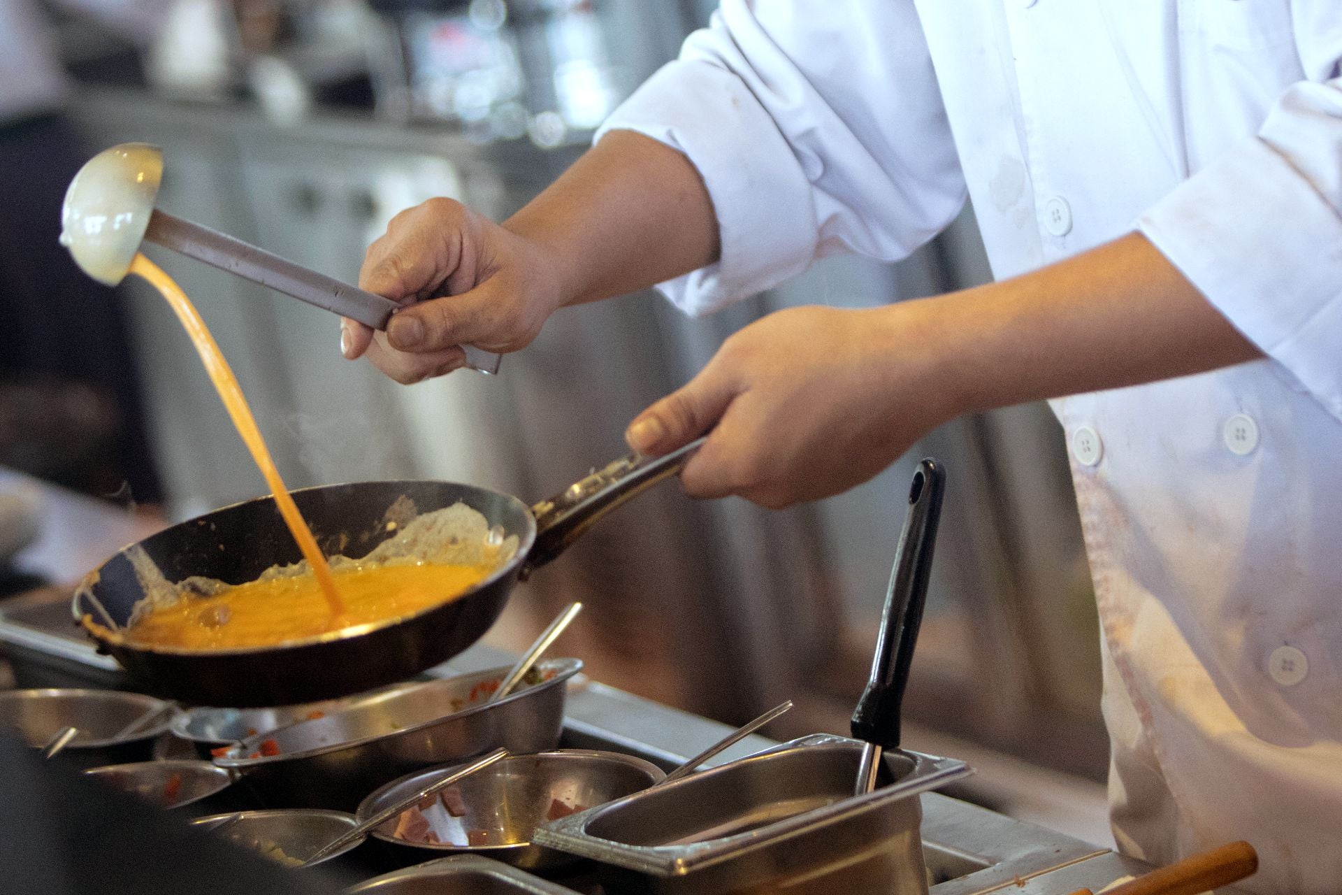 Scrambled eggs being prepared.
