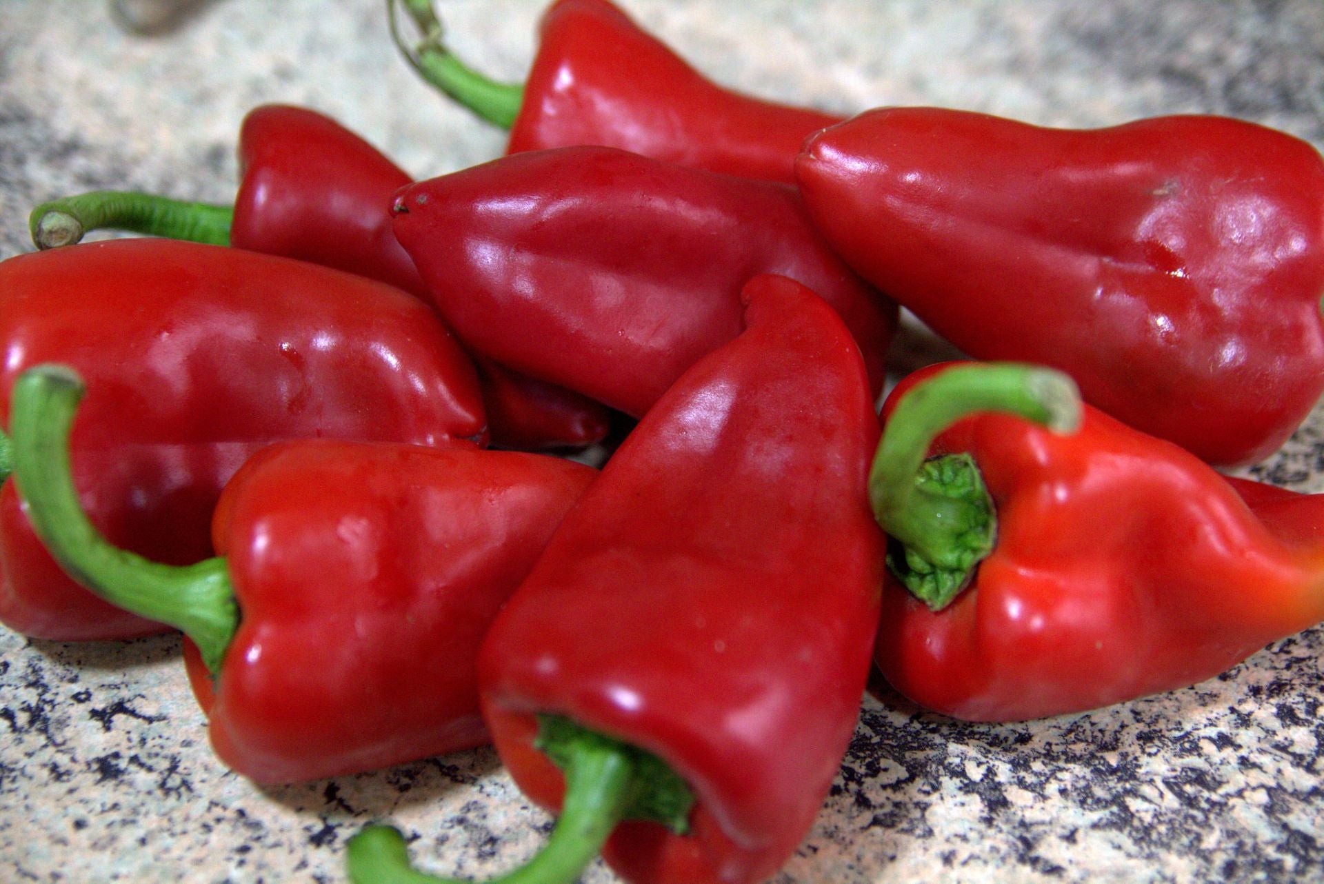 a number of fresh Piquillo peppers