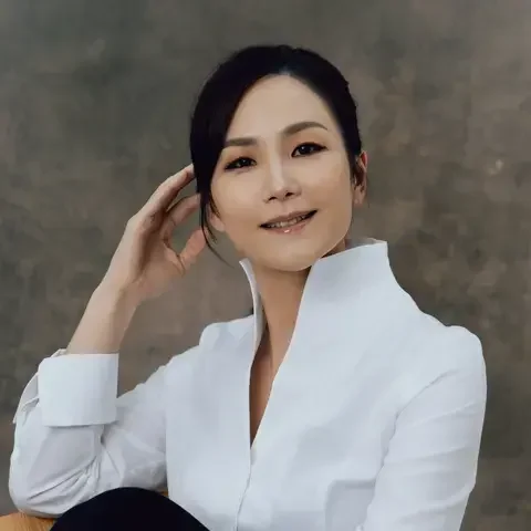Chef Vicky Lau wearing a white shirt.