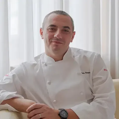 Chef Julien Royer seated at Odette.