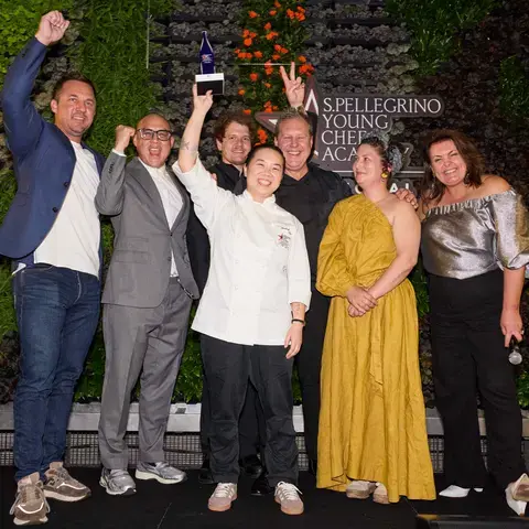 Kimberly Tang celebrating her win with the Pacific Local Jury.