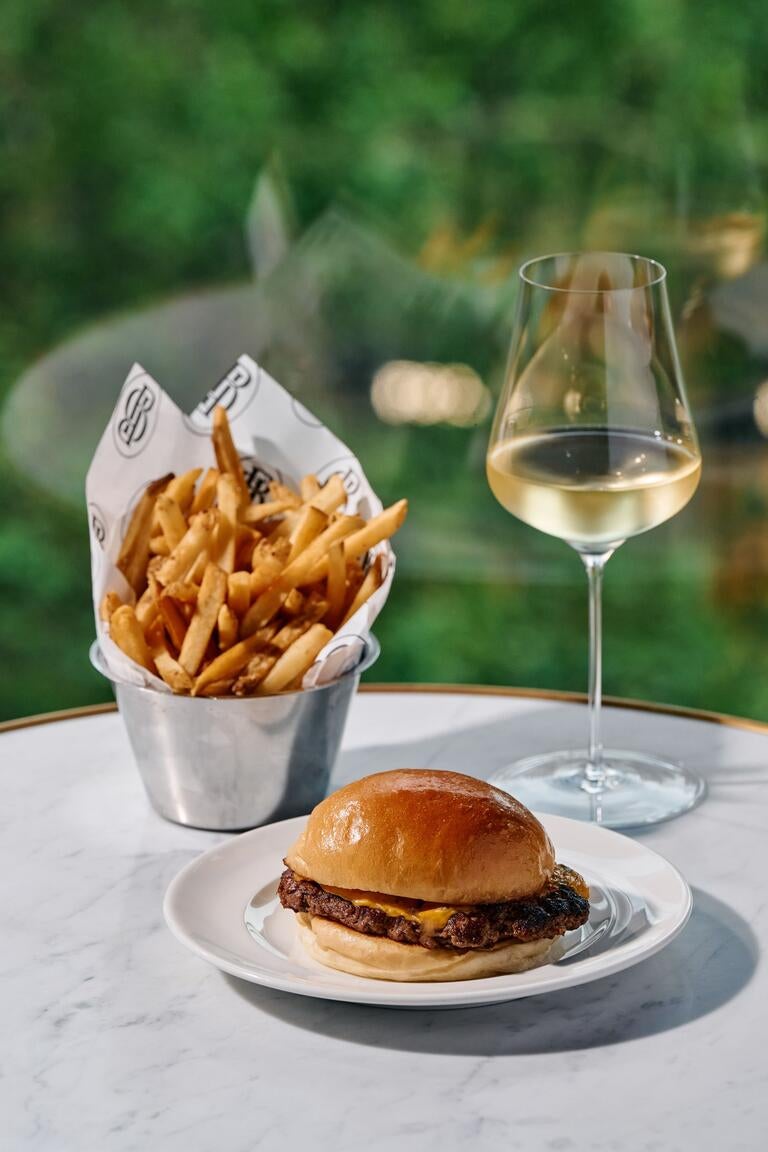 Cheeseburger and fries at Maison Bâtard in Melbourne.