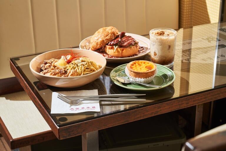 Dishes and a drink at Tai On Coffee and Tea.