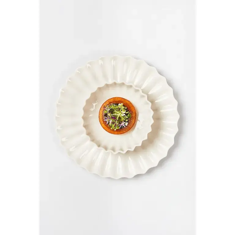 Rasmus Kofoed  Bread pancake with buttermilk, ramson &amp; winter truffle