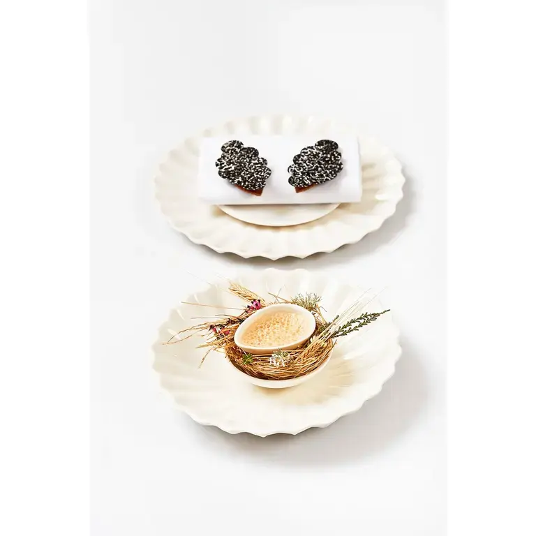 Rasmus Kofoed  Forest mushrooms, beer, smoked egg yolk, pickled hops &amp; rye bread