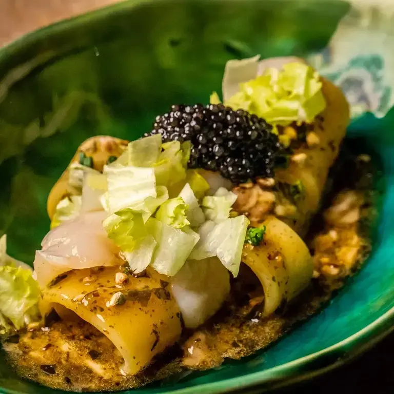 LE CALANDRE Calamari -shaped pasta with seaweed, fresh caviar, sea scallop crudo with escarole