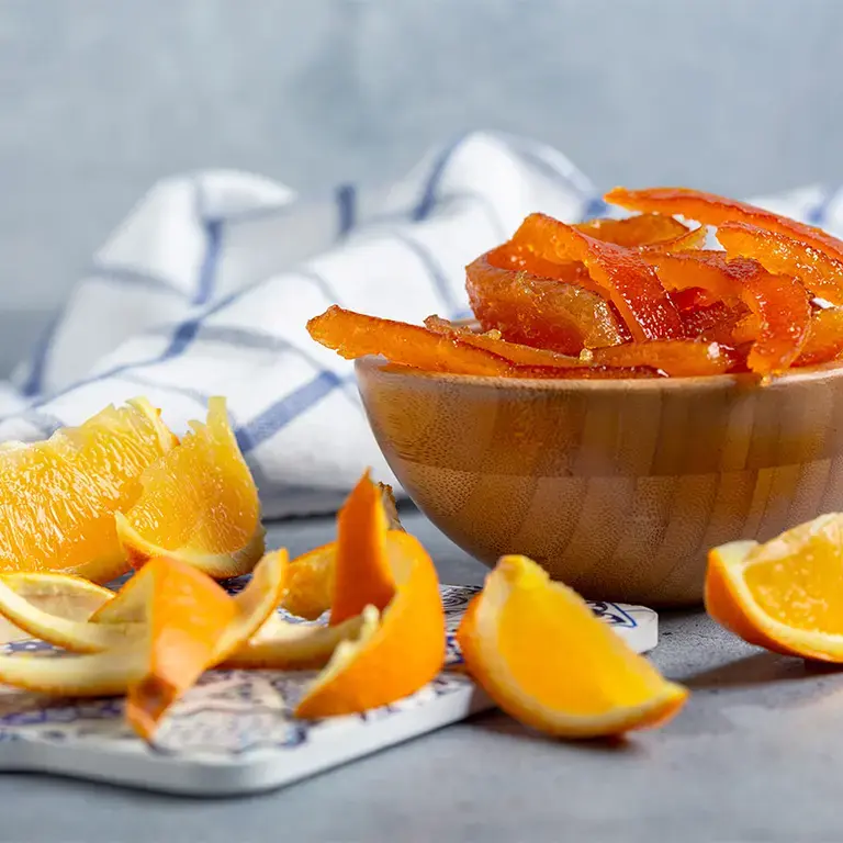 Candied orange peels and orange segments.