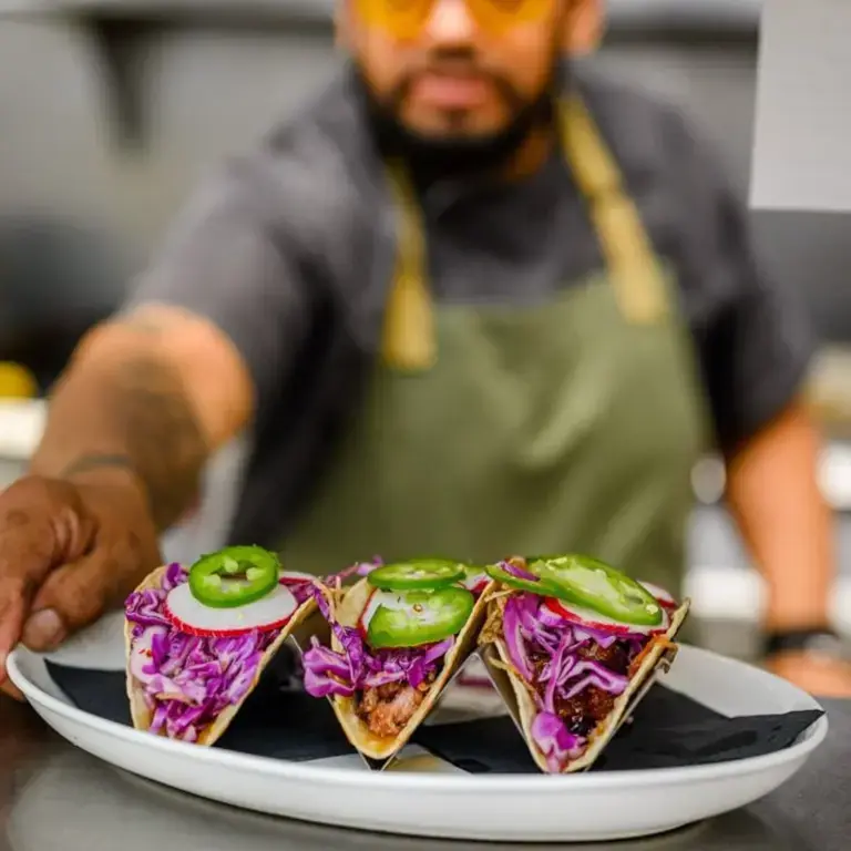 Chef with tacos