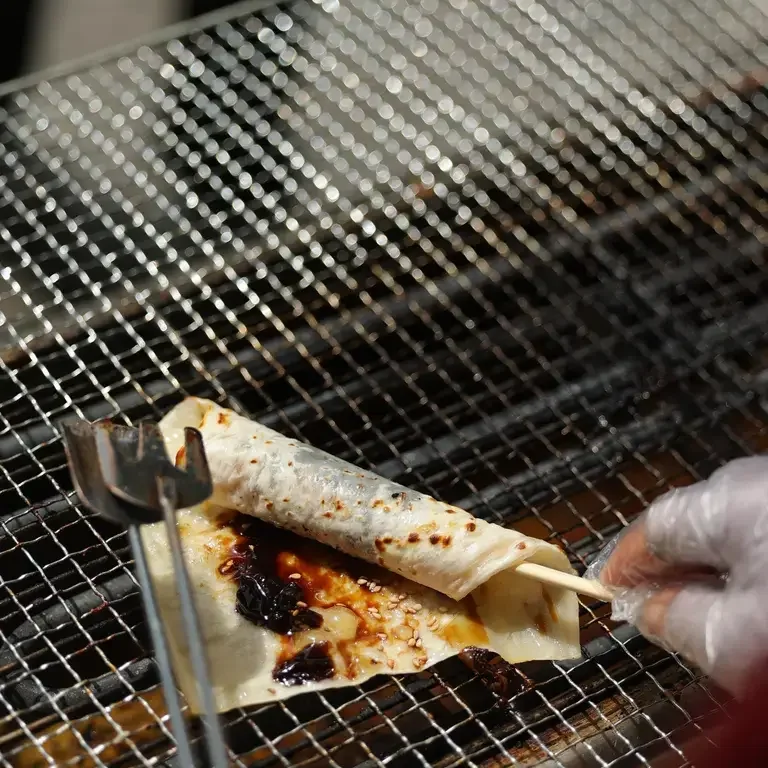 Street food on a grill in Yunnan.
