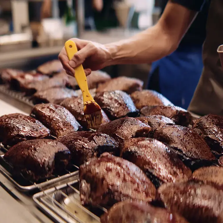 Meat being basted at Firecat.