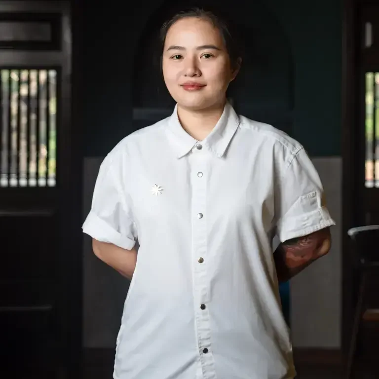 Sam Tran in chef whites.