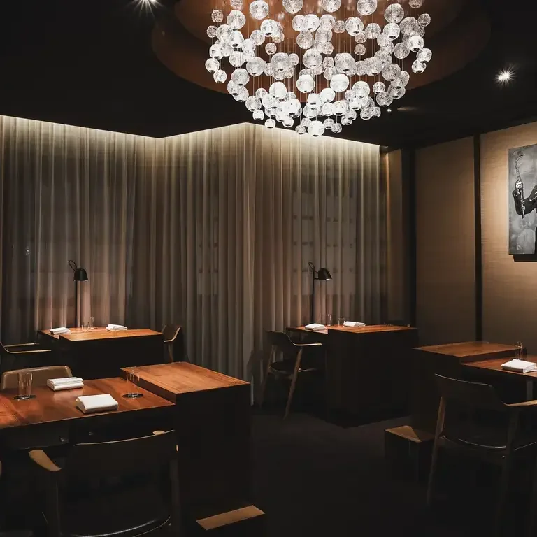 Low-lit dining room at Zén in Singapore.