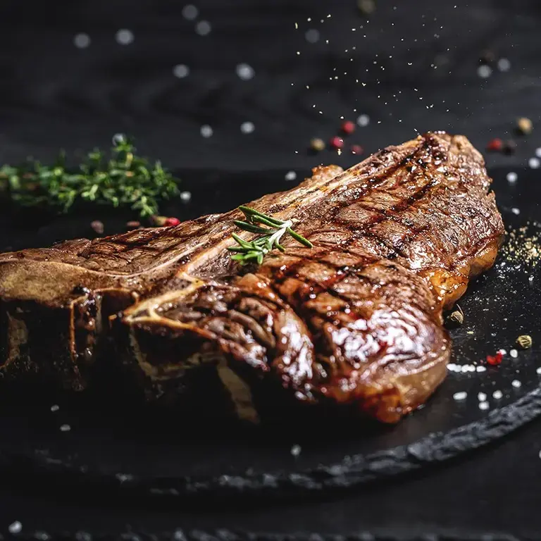 A cooked aged steak.