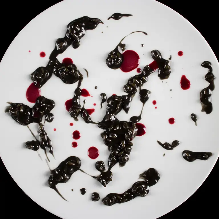 Risotto, black fermented garlic, berries at Lido 84.