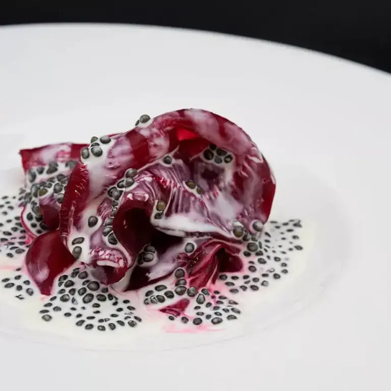 Salt-crusted beetroot with caviar by Mauro Colagreco.