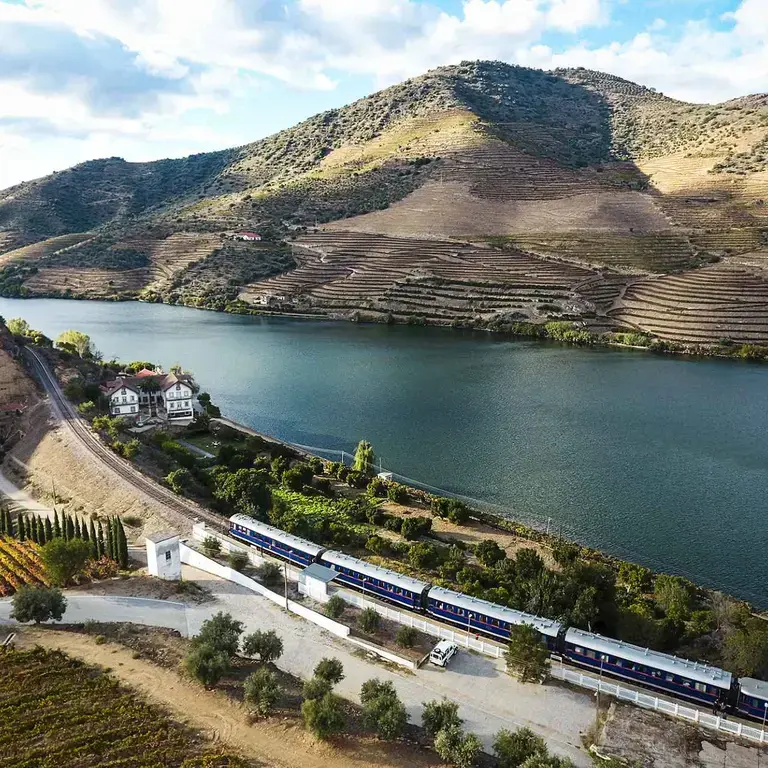 A train travelling through a valley.