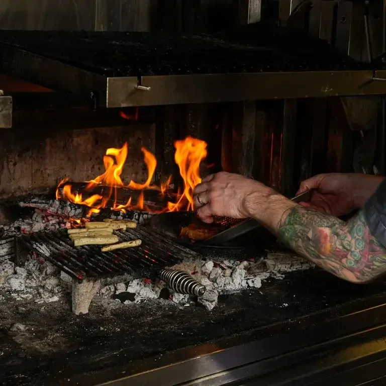 Cooking with embers and ash.