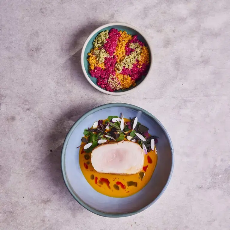 A paiche dish at Mauka restaurant in Cusco.