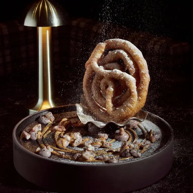 Zioux take on churros, pecan puree, Tres Leche sauce