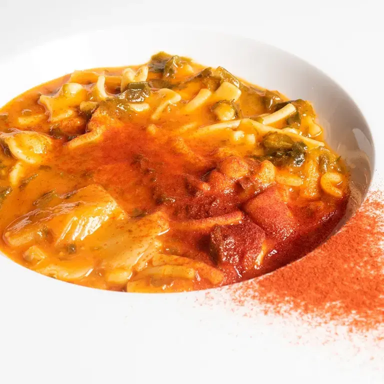 Mixed pasta, tomato cream, stockfish, seaweed and smoked pepper.