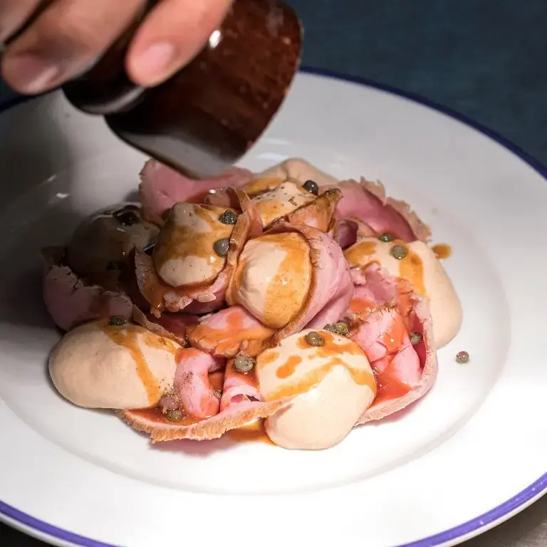 Chef Diego Rossi's vitello tonnato at Trippa in Milan.