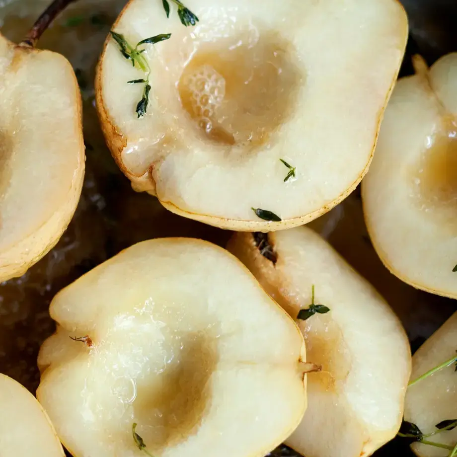 a selection of peeled and halved overripe pears