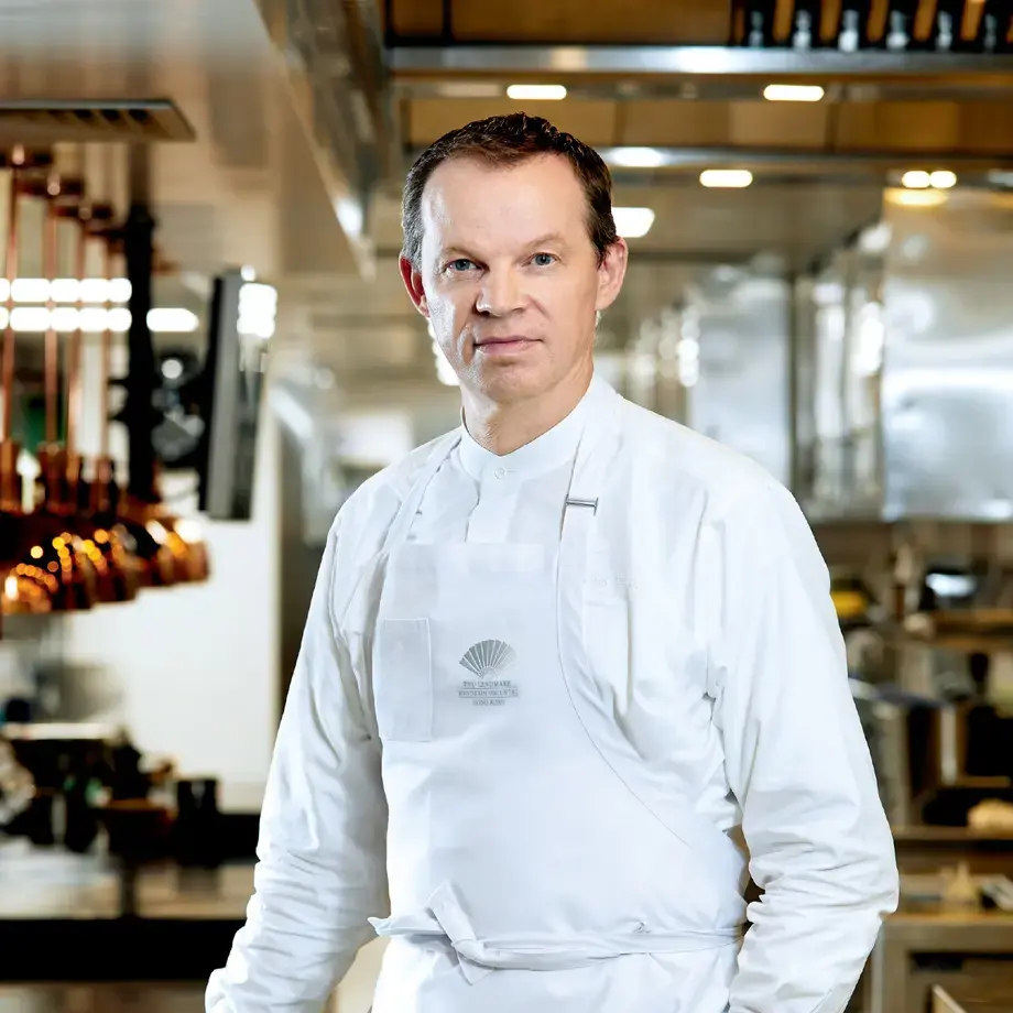 Chef Richard Ekkebus in the kitchen in chef whites.