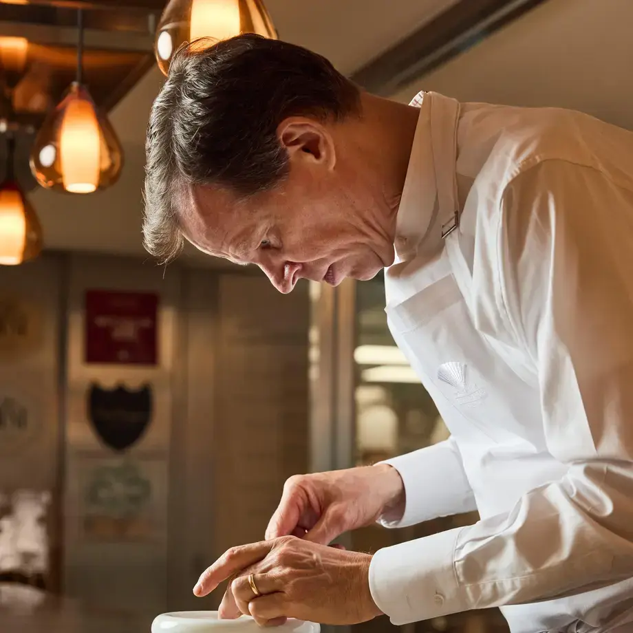 Chef Richard Ekkebus plating at Amber in Hong Kong.