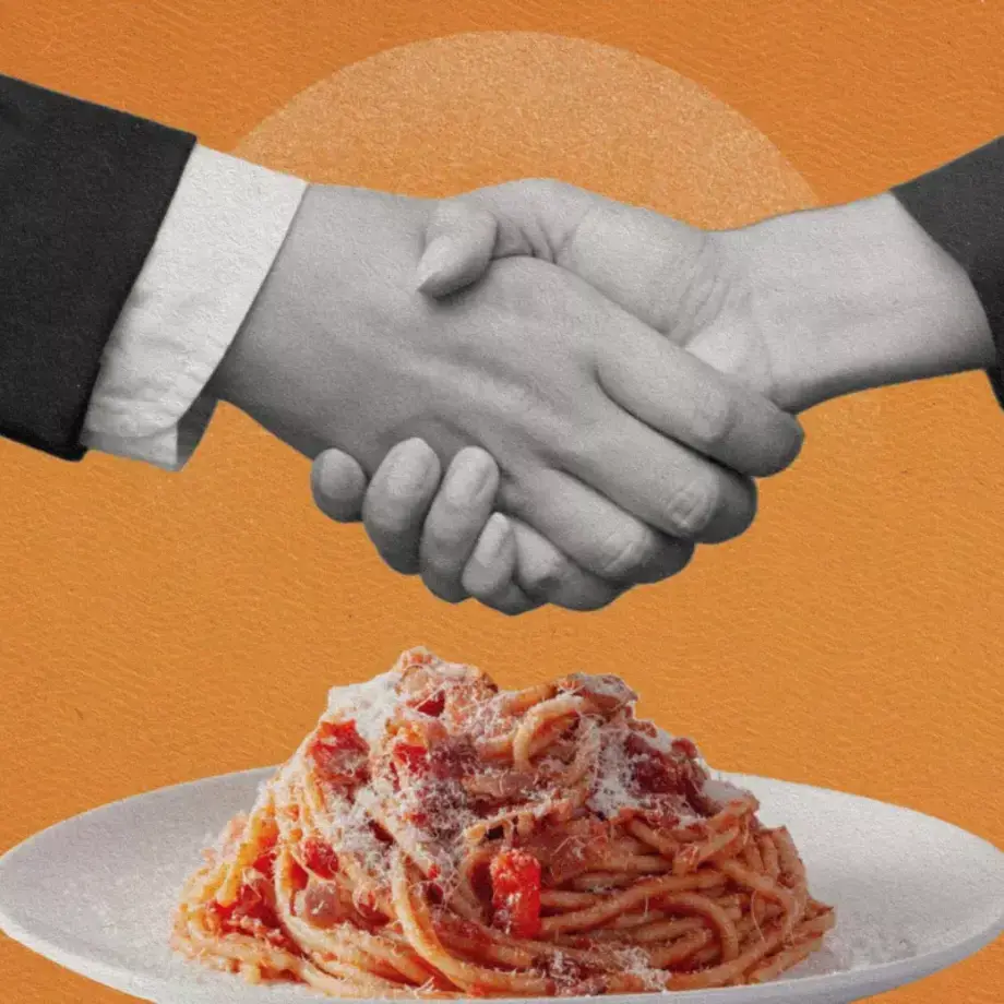 gastro-diplomacy-handsshake-over plate-of-spaghetti