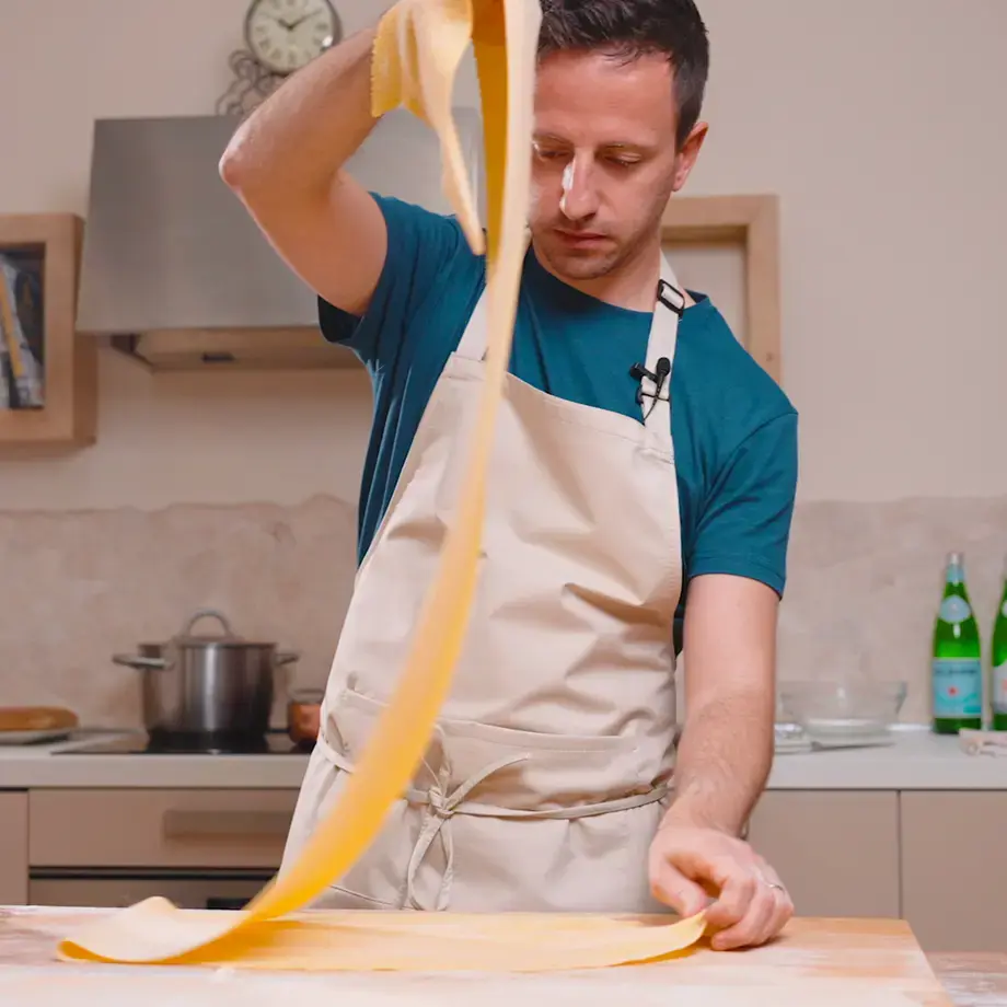 Chef Danilo Cortellini making fresh pasta.