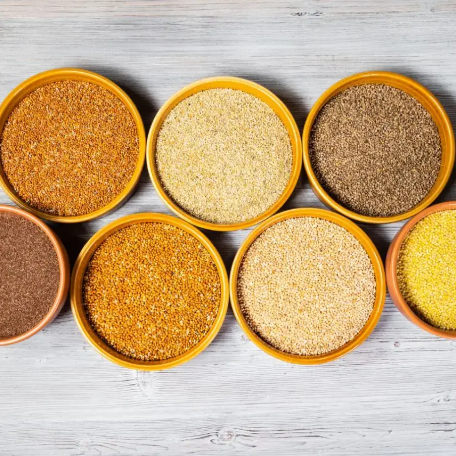 Different types of millet in bowls.