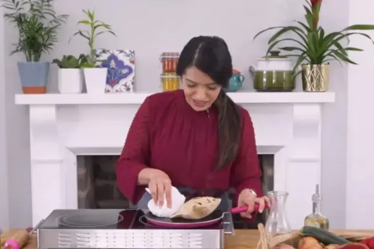 press the chapati lightly using a small towel