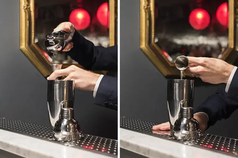 pouring lemon juice into a shaker