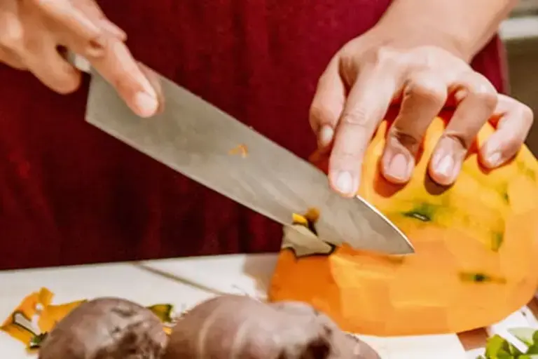 Cutting the pumpkin Courtesy of Chef Kezia Kristel