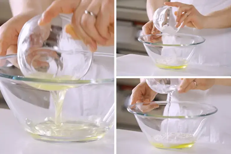 A white paste being mixed in a bowl.