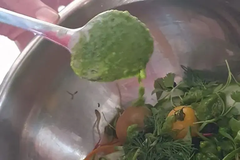 dressing the salad Courtesy of Chef Marcus Gericke