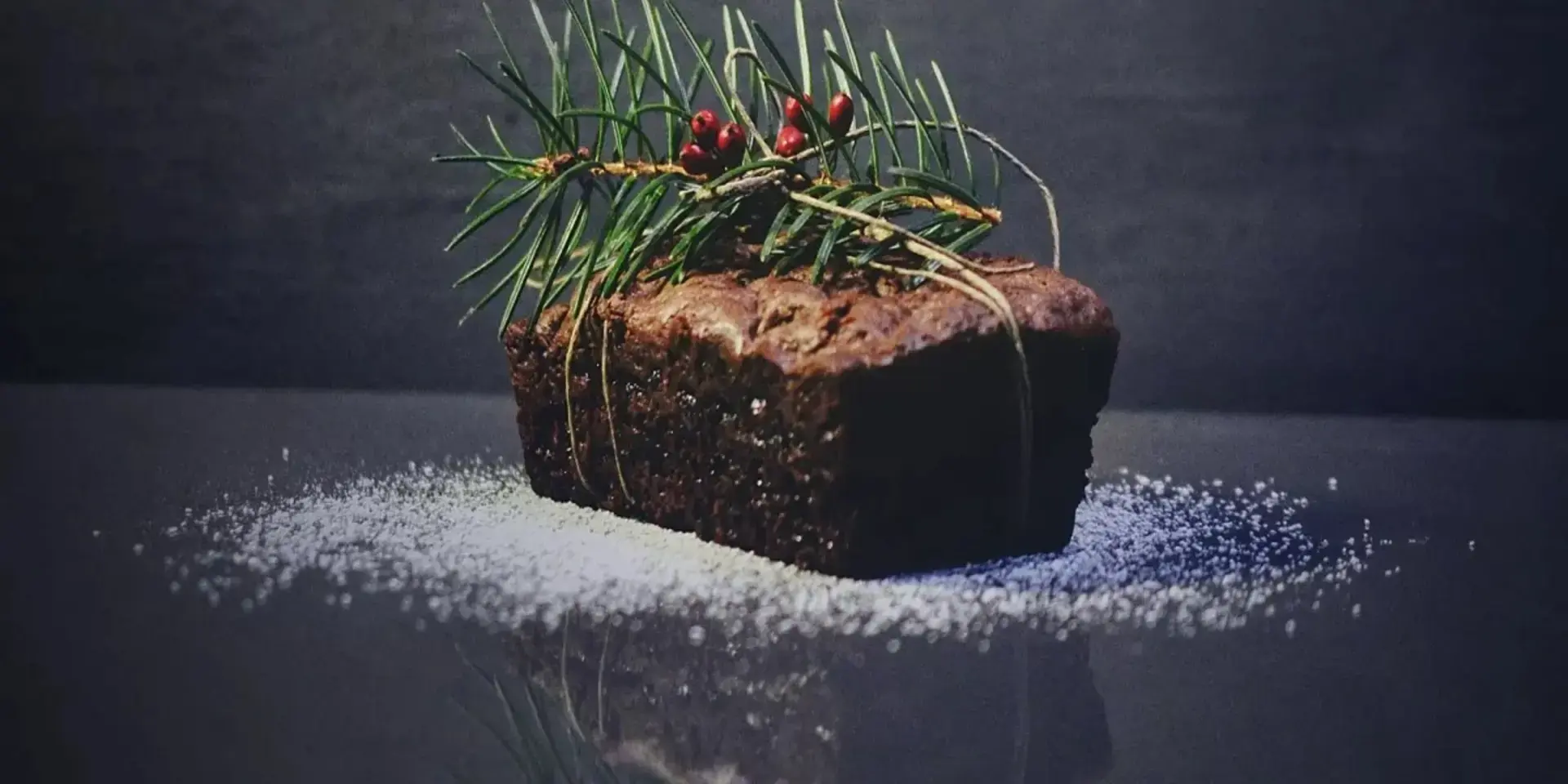 A Christmas cake with a pine twig decoration