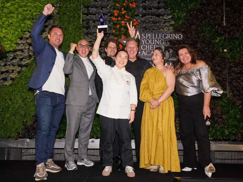 Kimberly Tang celebrating her win with the Pacific Local Jury.