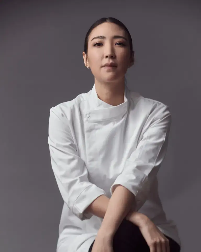 Chef Pam sitting cross-legged.