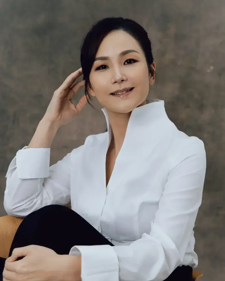 Chef Vicky Lau wearing a white shirt.